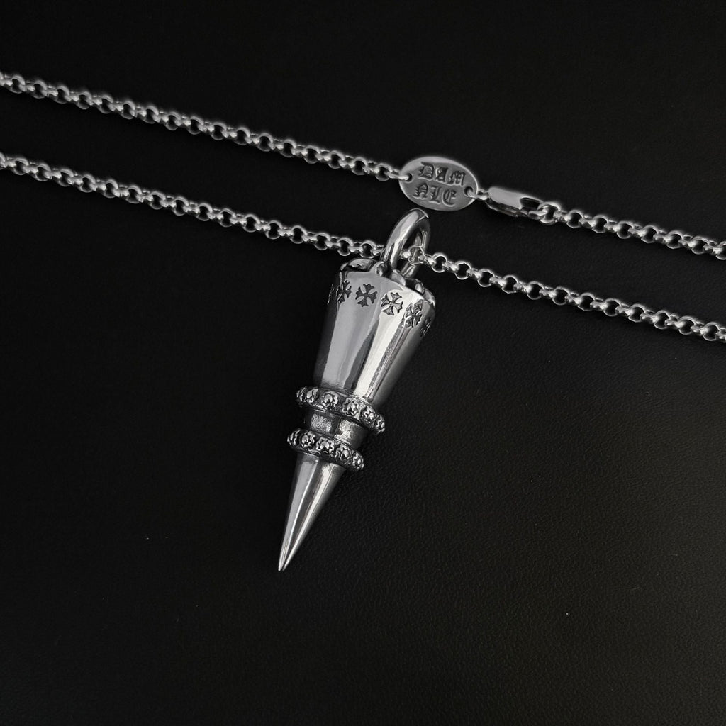 Chrome Hearts distressed cross rivet bullet pendant