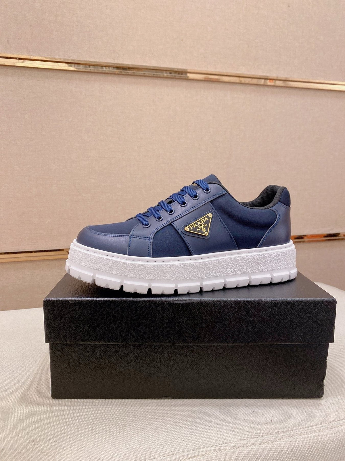 Prada Triangle Plaque Low-Top Sneakers - Treaded Rubber Sole